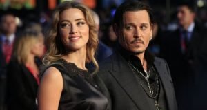 Amber Heard and Johnny Depp row over divorce donations